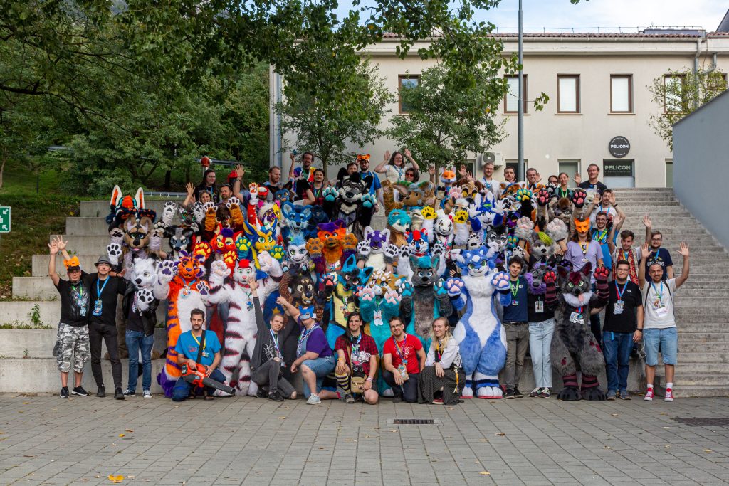 The group photo taken at GoldenHorn 2023 showing attendees and fursuiters